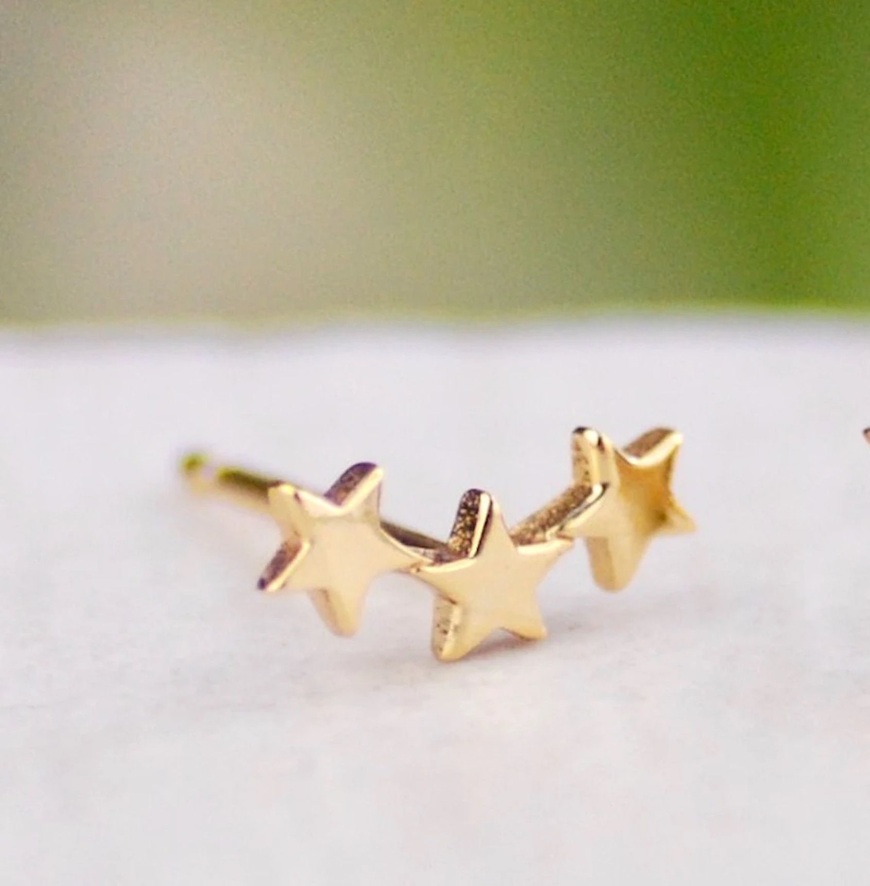 Tiny Gold Star Ear Climber
