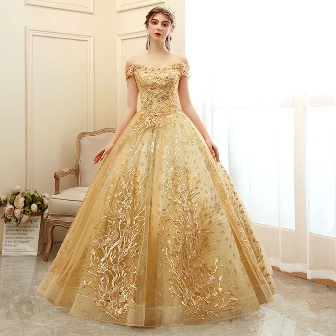 Sophisticated Gold Embroidered Off-Shoulder Ball Gown